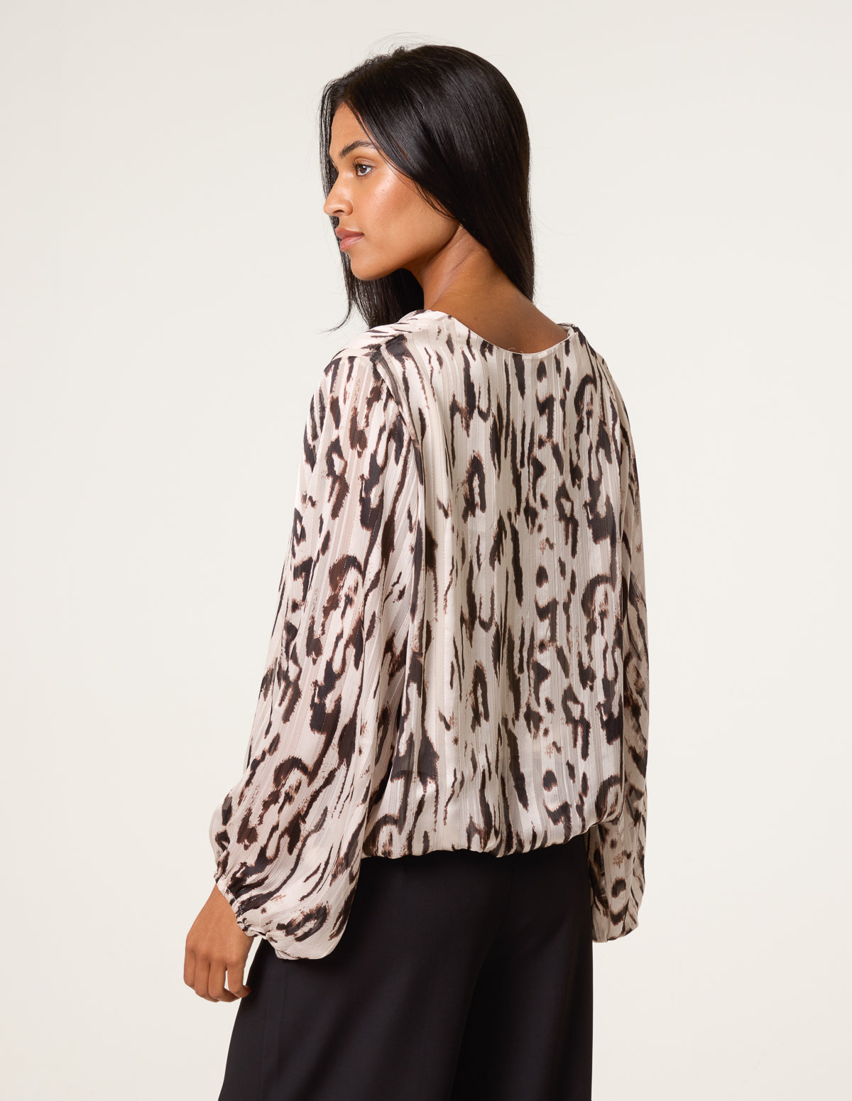 Animal Print Puffball V Neck Top