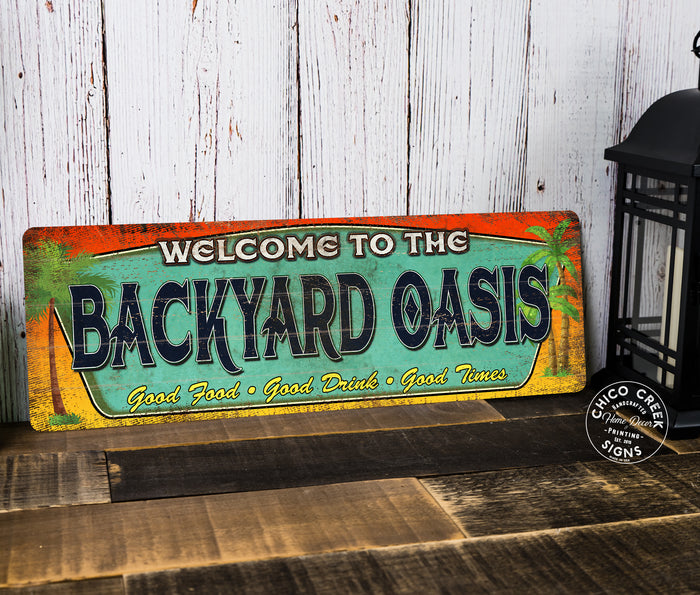 Backyard oasis metal sign with poolside paradise styling for patio, pool, and outdoor wall decor