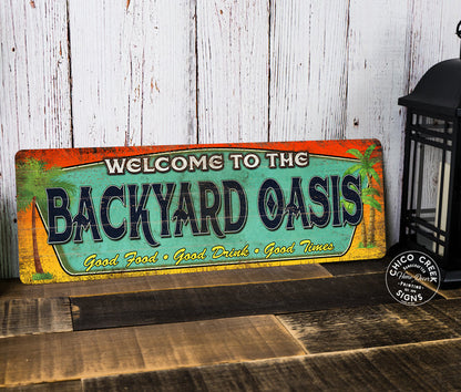 Backyard oasis metal sign with poolside paradise styling for patio, pool, and outdoor wall decor