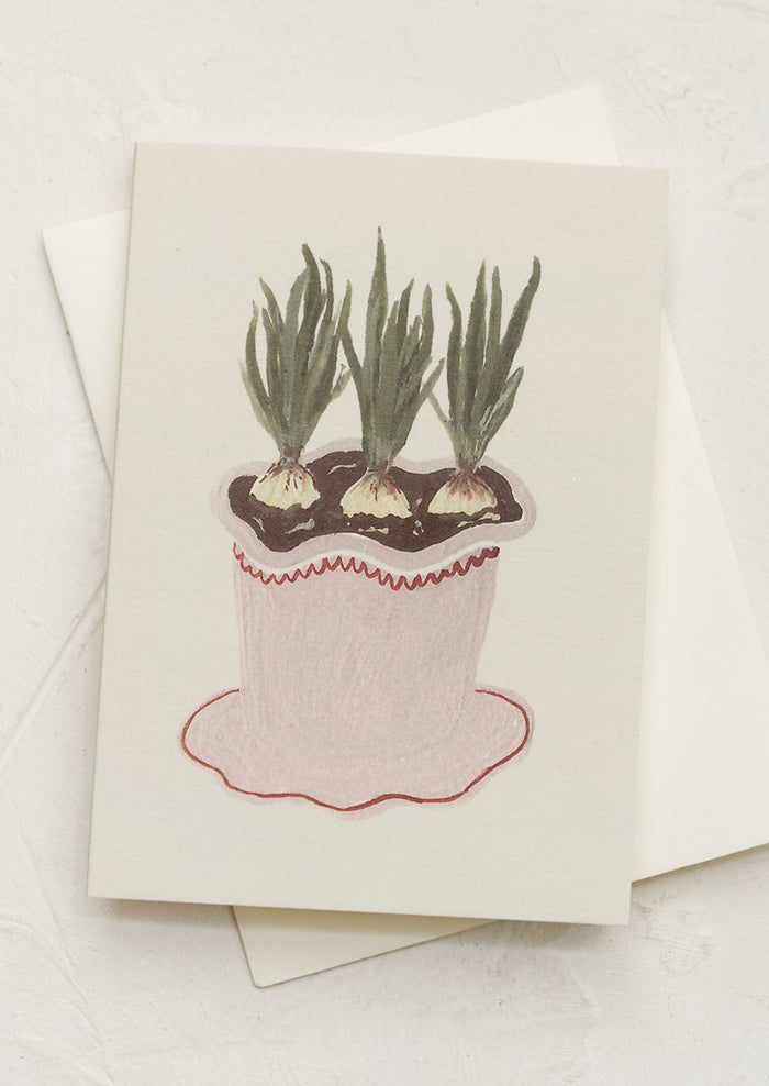 A mini greeting card in cream with illustration of bulbs in pot.