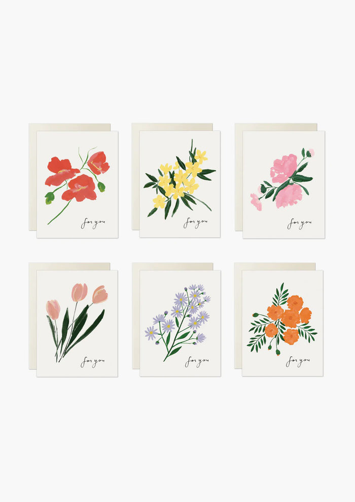 A set of white greeting cards in assorted floral prints with text at corner reading "for you".