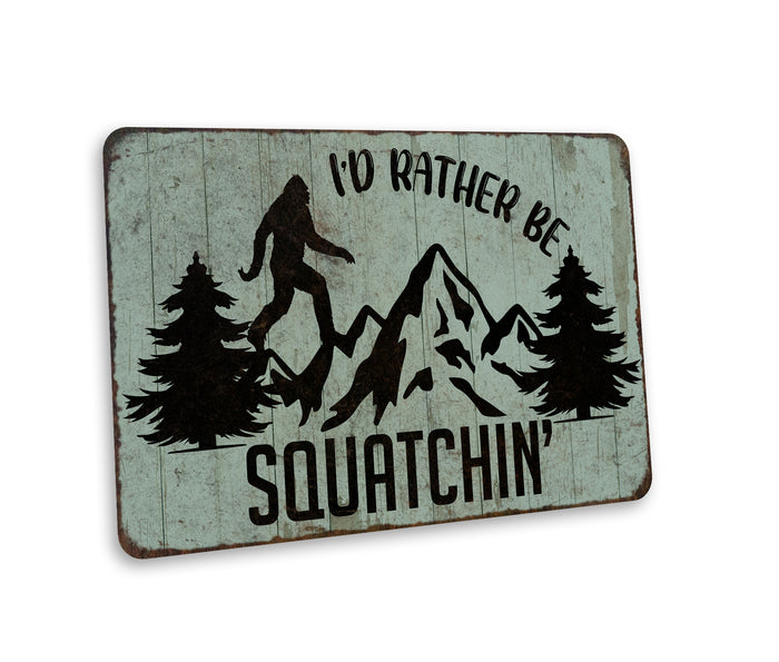 Funny rustic metal I'd Rather Be Squachin Bigfoot sign for cabin, camper or yard decor