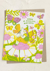 A greeting card with image of fairy and butterfly, text reads "Have a magical birthday".