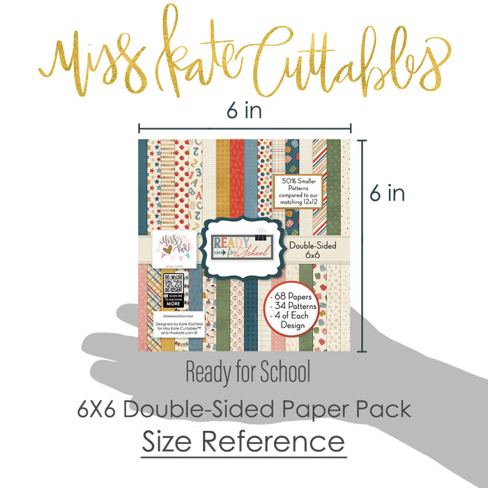 Ready for School 6x6 Double-Sided Paper Pack, size guide shown in hand for scale, showing 6x6 scrapbook paper for handmade cards, mini albums, junk journals, paper layering, small-scale layouts, and coordinated paper crafts. Buyer theme: Back to School Card Making & Mini Album Paper Pack. Ready for School 6x6 Double-Sided Paper Pack with scaled schoolhouse patterns including stars, apples, plaid, backpacks, paperclips, notebook lines and graph grids