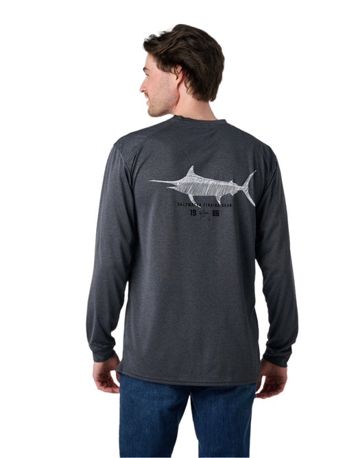 Man wearing a dark gray long-sleeve shirt with a fish graphic on the back against a white background