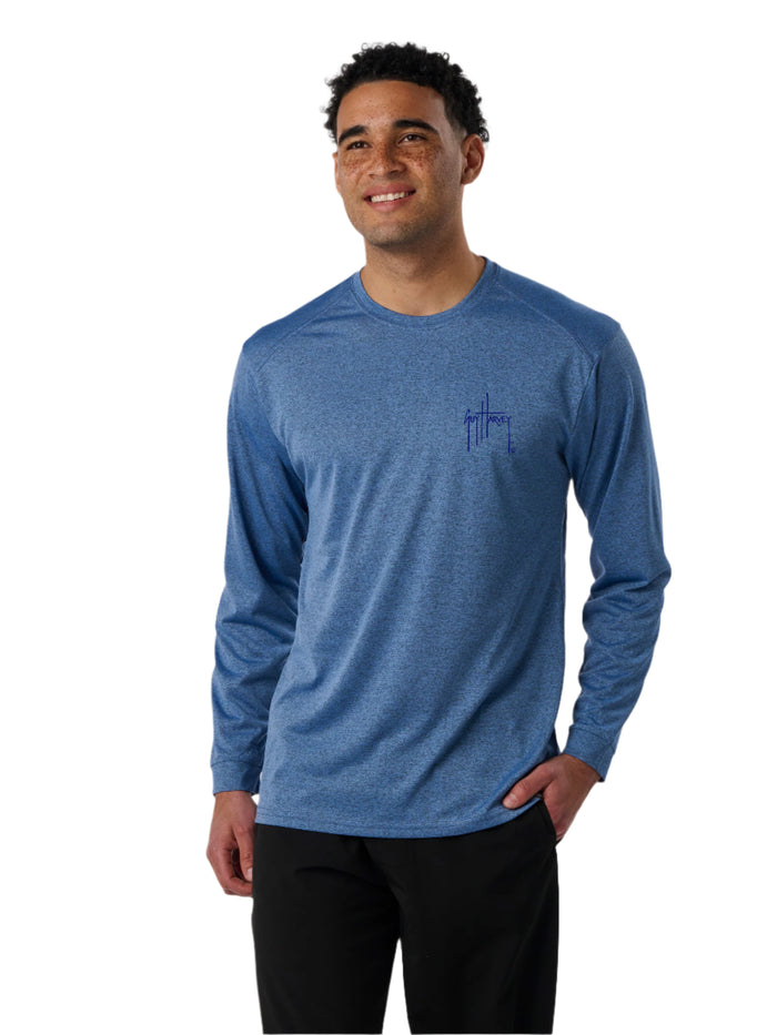 Man wearing a blue long-sleeve shirt with a logo on a white background