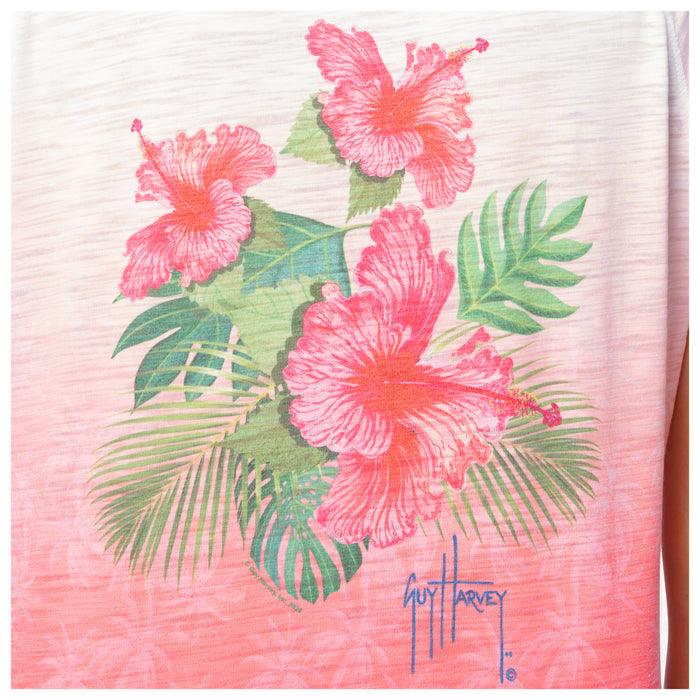 Shirt with pink floral design and Guy Harvey signature on a white background